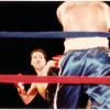 Kicking his opponent.