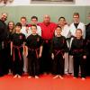 Hanshi Anzures standing with the students.