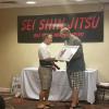 Gary Lovins being promoted to 8th degree Black Belt and earning the Hanshi title.