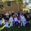Monday during Memorial Day, walking in the parade with TASK Karate. Having the spectators do Kicks for Candy!
