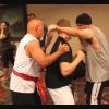 Hanshi Anzures working with the kickboxers.